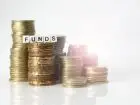 Fundusz Koscielny - stosy monet podpisane funds